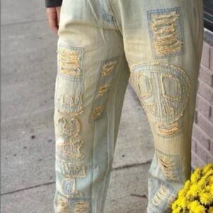 Distressed Denim Jeans with Peace Sign